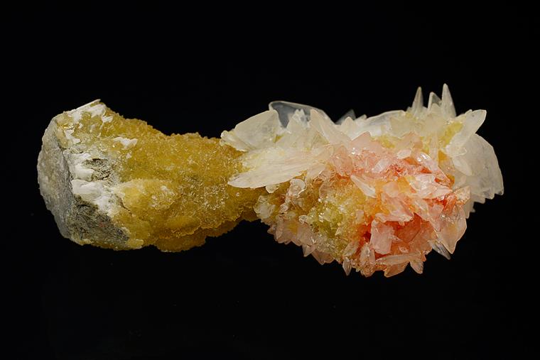 COLEMANITE with REALGAR on CALCITE